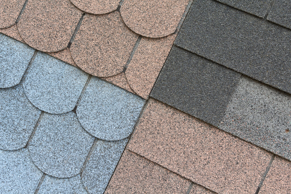 Soft roof, roof tiles, flexible shingles. Roof tiling texture. Flexible, soft bituminous composite on shop window. Construction